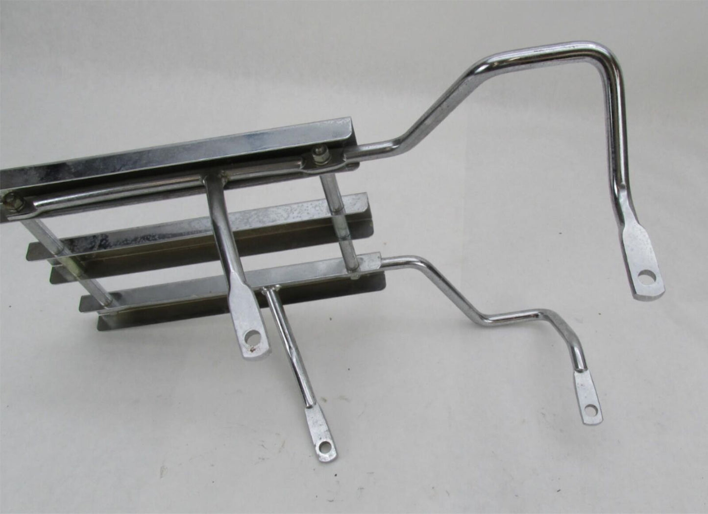 Harley ‘00+ Softail FLSTC Chrome 3 Channel Luggage Rack w/ Grab Rail 53941-03