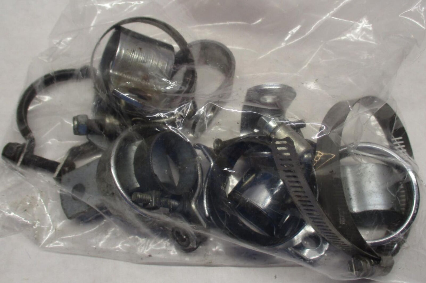 Mixed Lot of Harley Davidson Exhaust Clamp Brackets and Hardware
