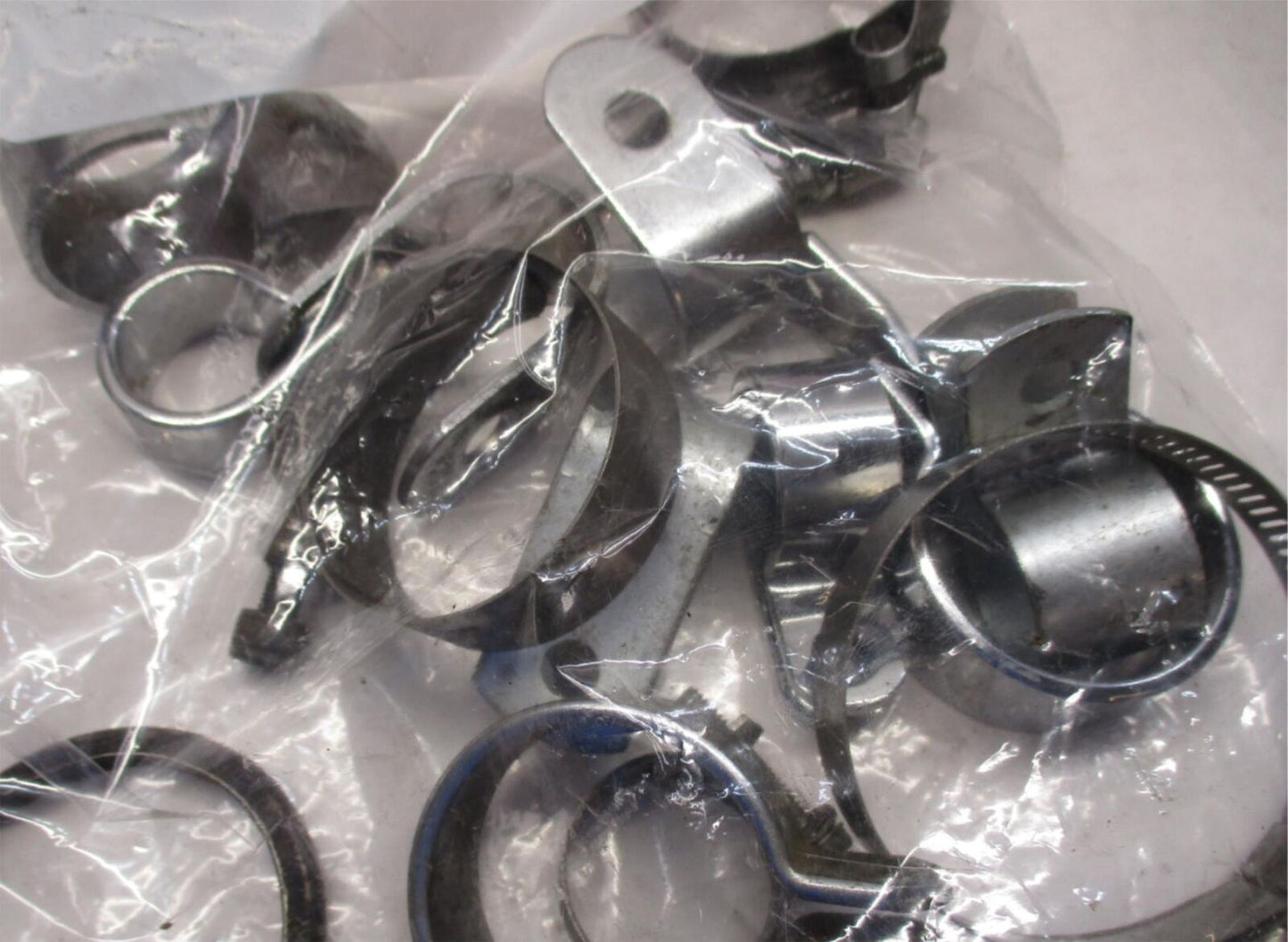 Mixed Lot of Harley Davidson Exhaust Clamp Brackets and Hardware