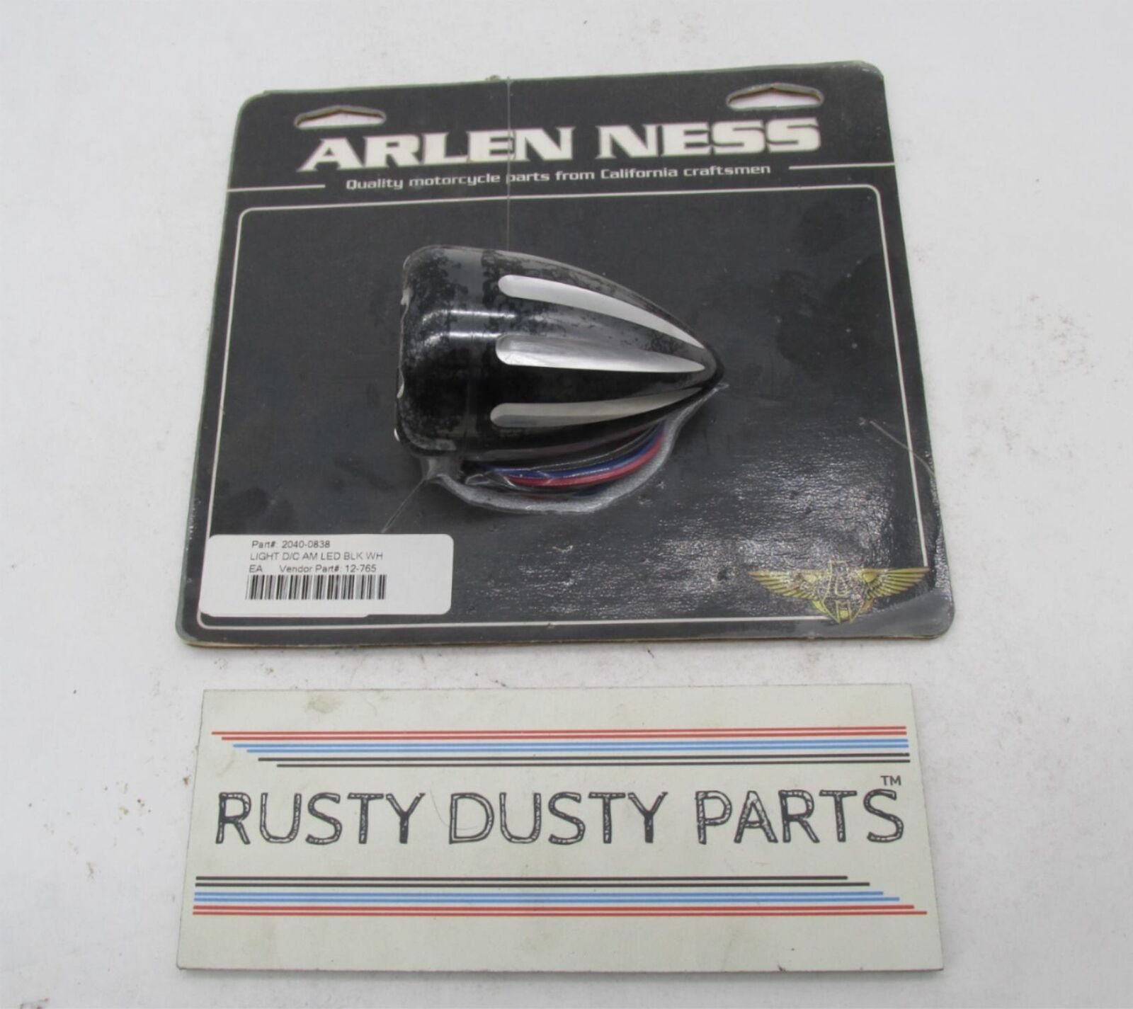 Arlen Ness Light Black Deep Cut Amber Lens Turn Signal and LED Trim Ring 12-765