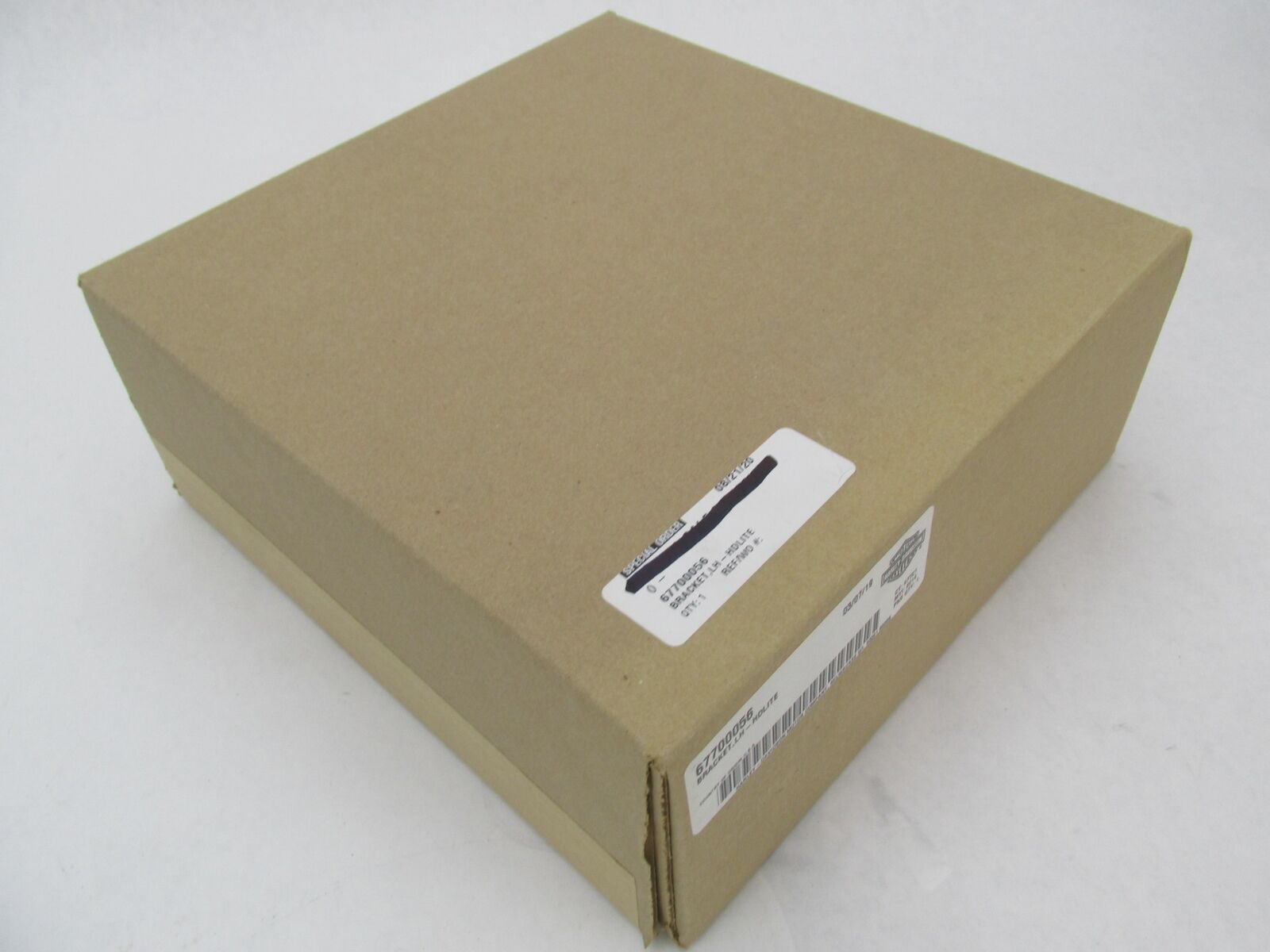 Harley-Davidson Genuine NOS FLHTCUTG LH Headlight Bracket 67700056