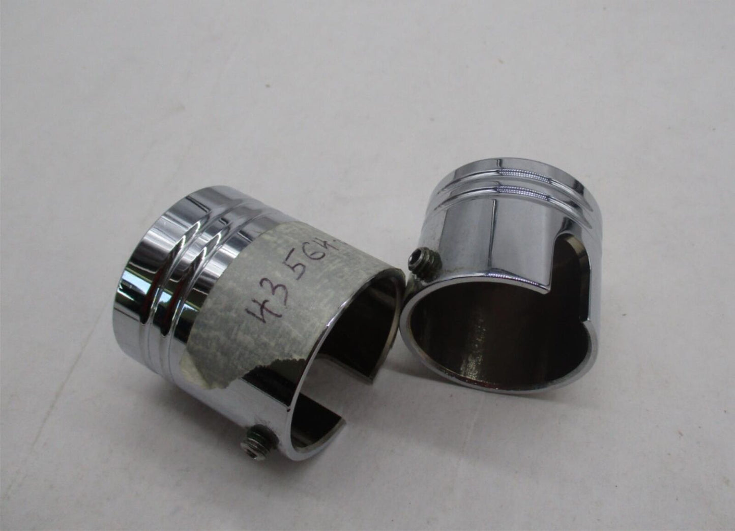 Set of Harley Davidson Genuine Piston Front Axle Nut Covers 43564-04A