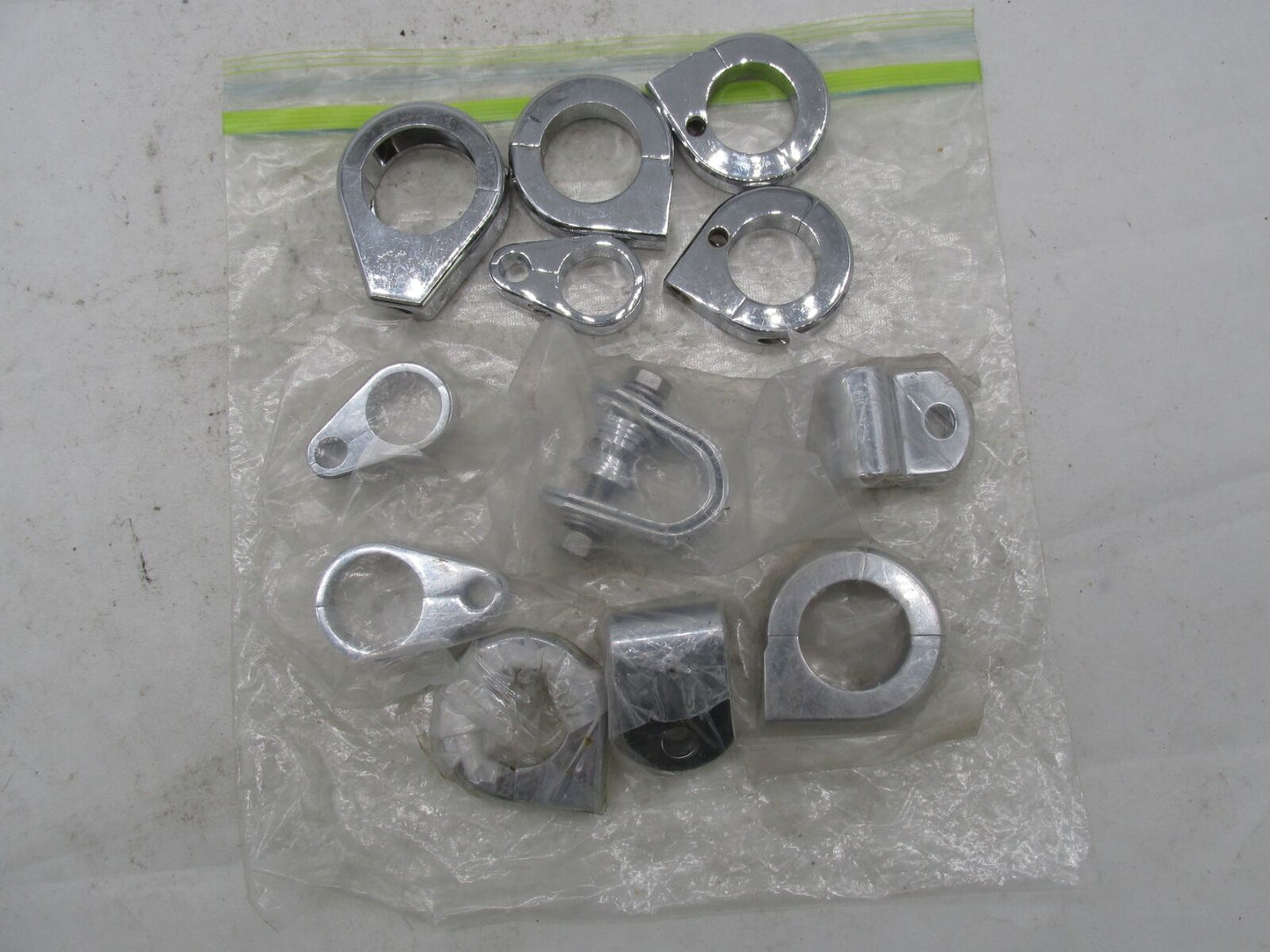 Large Mixed Lot of Harley Davidson Chrome Handlebar Cable Hose Brake Line Clamps