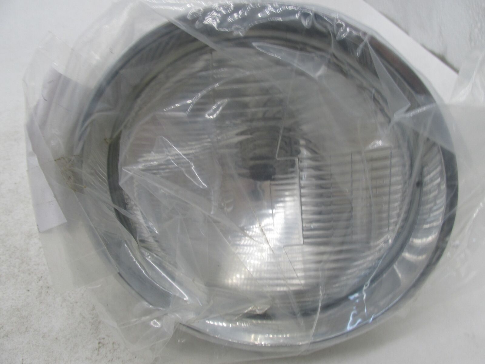 Kustomwerkz Harley 7" Chrome Headlight with Billet Trim H4 12V 76078