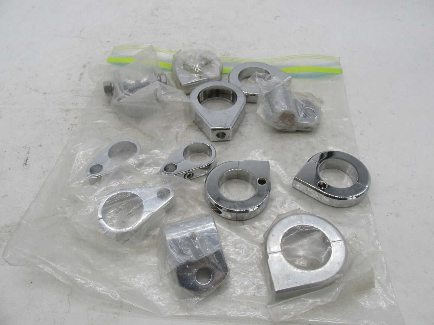 Large Mixed Lot of Harley Davidson Chrome Handlebar Cable Hose Brake Line Clamps