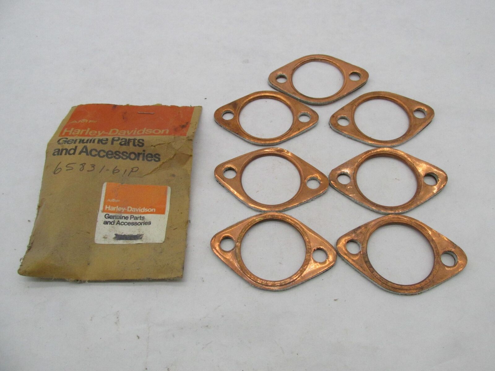 Lot of 7 Harley-Davidson Genuine Aermacchi NOS Exhaust Pipe Gaskets 65831-61P