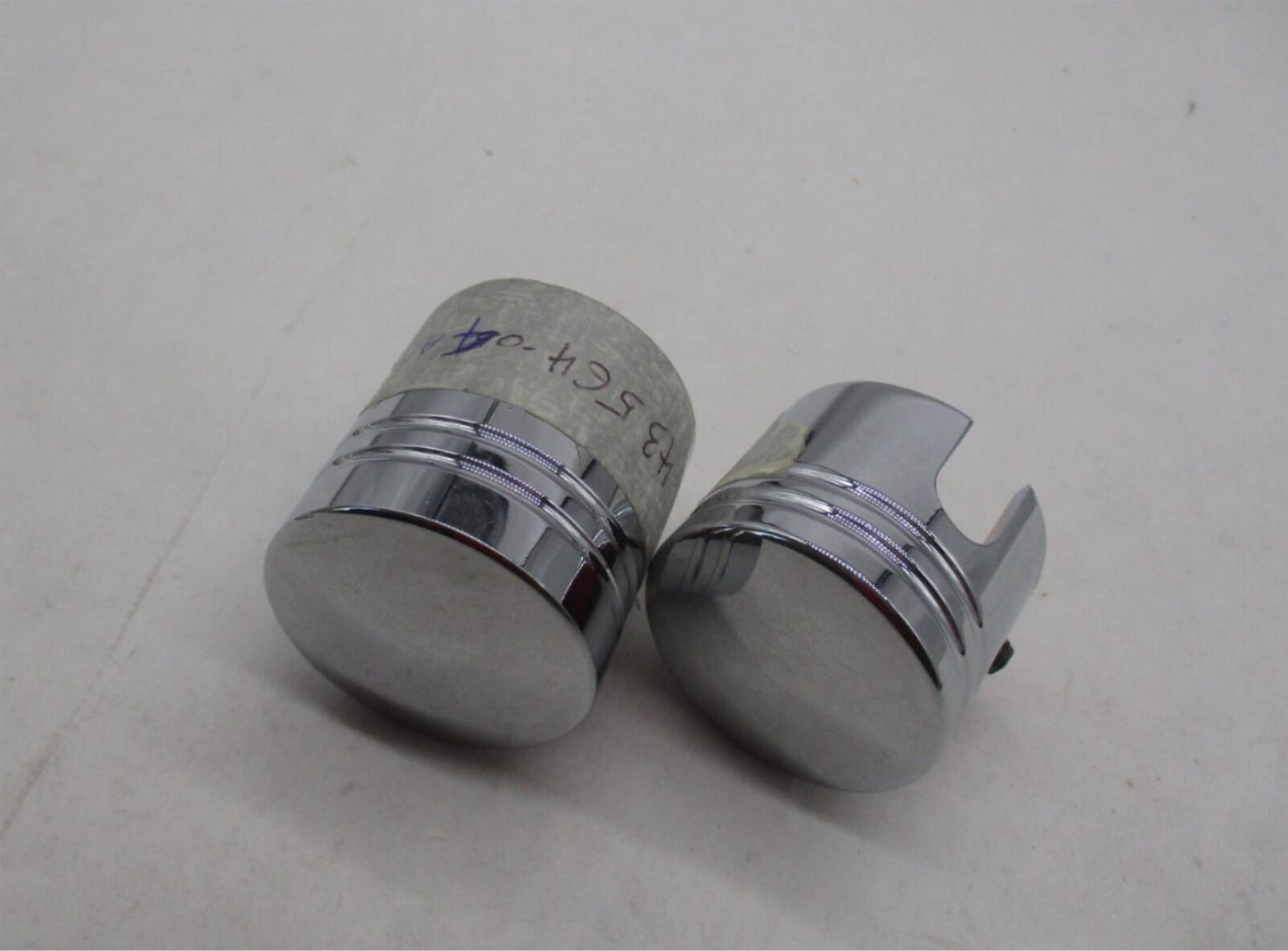 Set of Harley Davidson Genuine Piston Front Axle Nut Covers 43564-04A