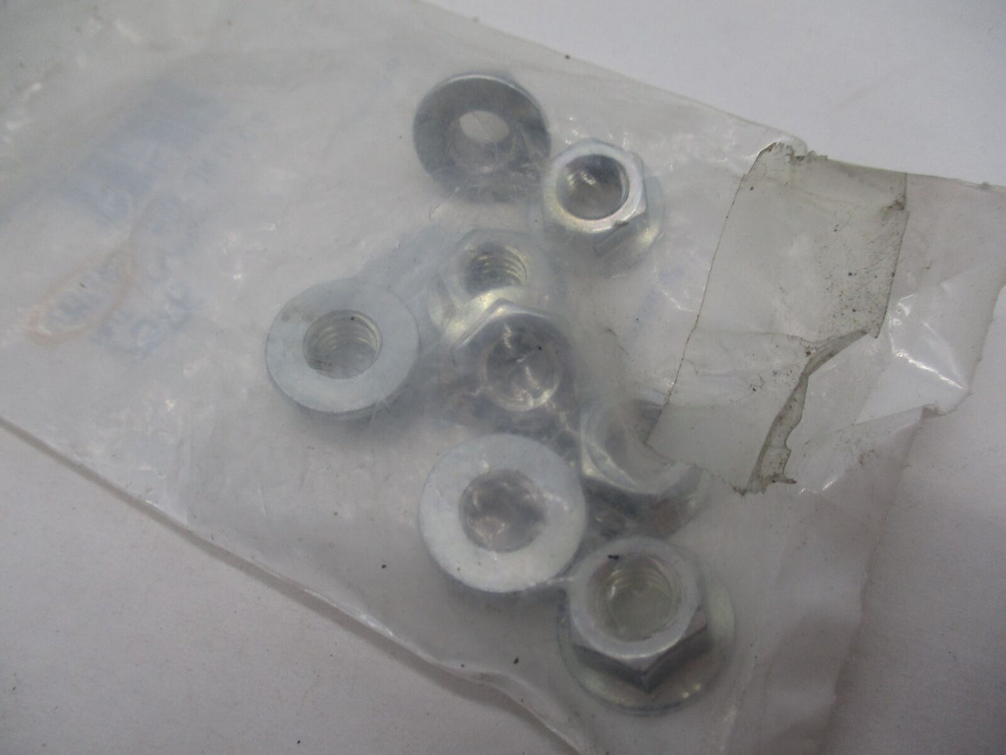 Lot of 8 Harley Davidson Genuine NOS AMT 10 5/16" Flange Nuts 7576