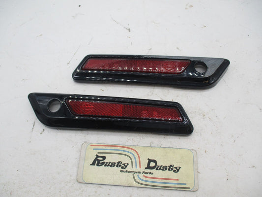 Pair of Harley Black Saddlebag Handle Reflection Plates 90200448 90200449