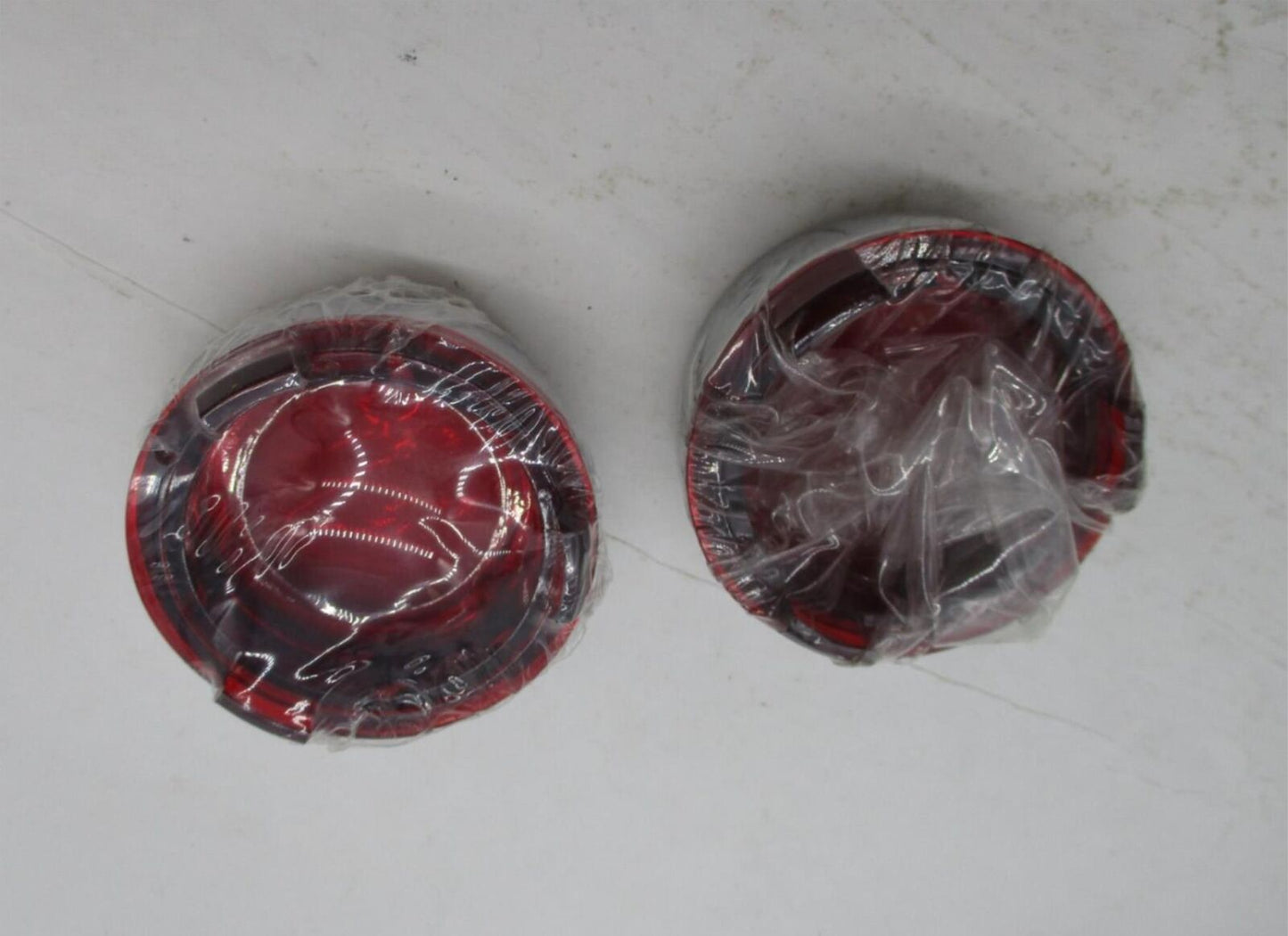 Pair of Harley Kuryakyn Deep Dish Turn Signal Bezels Light Red Lenses 2107