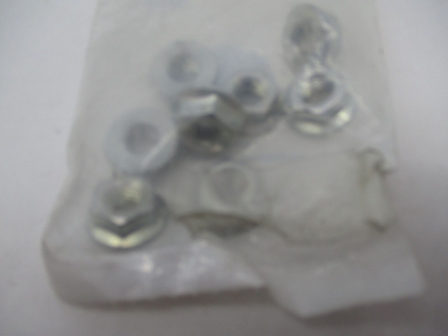 Lot of 8 Harley Davidson Genuine NOS AMT 10 5/16" Flange Nuts 7576