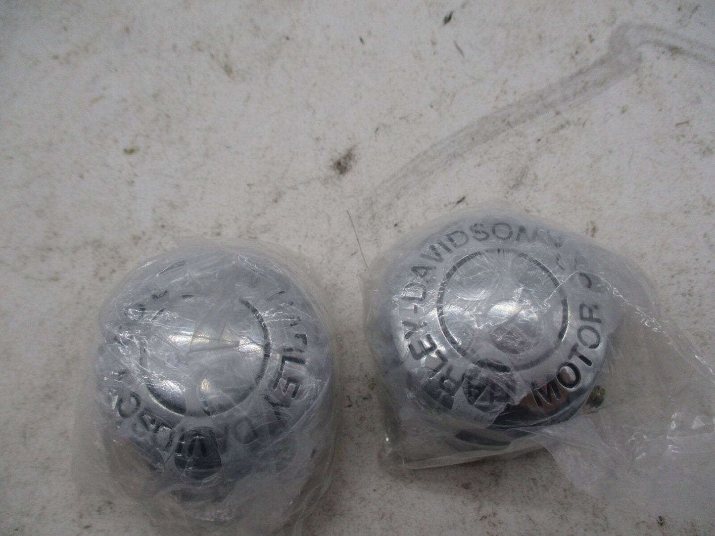 Pair of Harley Davidson Genuine NOS Motor CO. Chrome Axle End Cap Covers