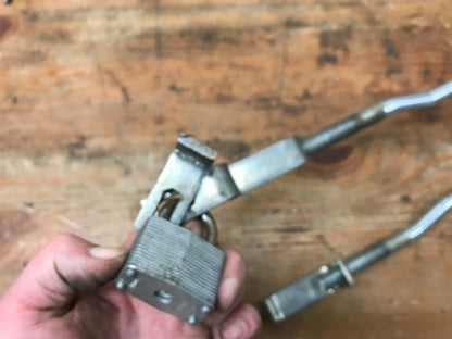 Vintage Motorcycle "Universal Front Wheel Lock Broken For Parts